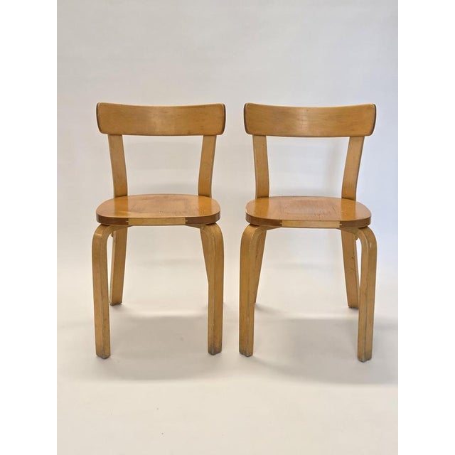 Artek 69 chairs 2 pcs, birch. The chairs are from around the 1950s. Wear consistent with age. Designer Alvar Aalto. I have...