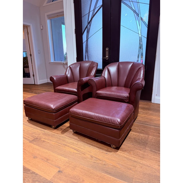 An exceptional four-piece Hancock & Moore seating ensemble comprised of a matching pair of swivel lounge chairs and...