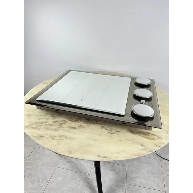 Wolf bath mirror, Italian design of the 70s Three E14 lamps with Dimmer that regulates the intensity of the light. Intact...