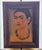 This vintage Turista Mexican folk art lithograph reproduction depicts Frida Kahlo’s iconic 1933 “Self-Portrait with...
