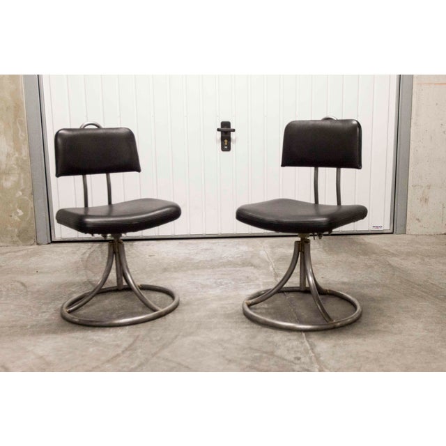 French Army industrial office chair from the 1950s. These swivel chairs are height-adjustable. They have an industrial or...