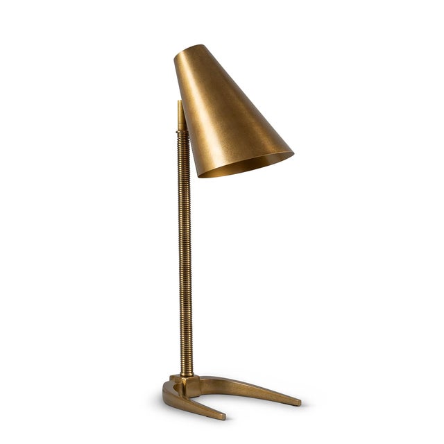 Oslo is our architecturally designed task lamp featuring a modern turned metal support column and aged brass finished...