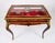This is a beautiful antique French ormolu mounted Louis Revival bijouterie table, circa 1860 in date. The shaped top...