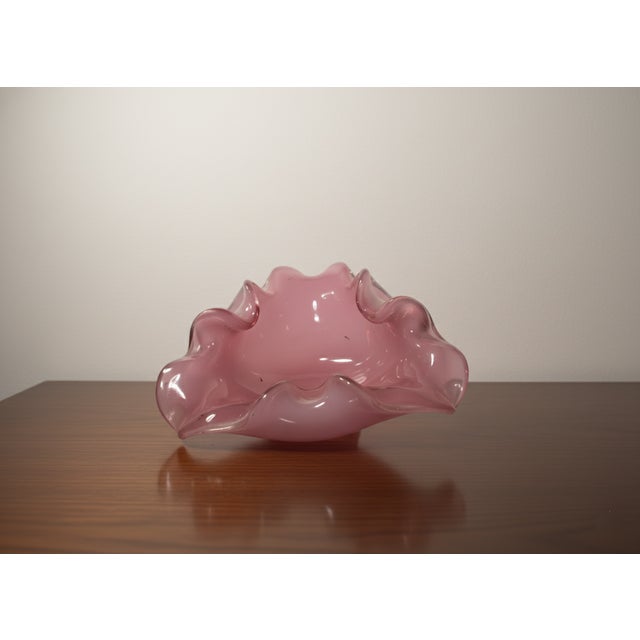 Seguso centerpiece, in vintage opaline Murano glass, from the 1950s, featuring a delicate pink color and sinuous shapes....