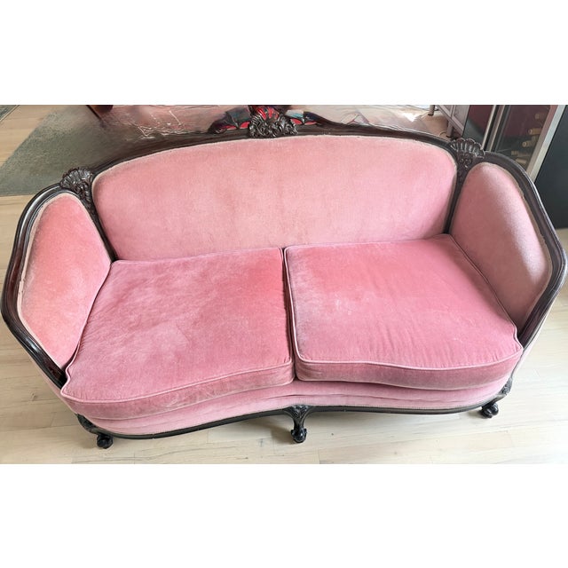 The Rococo carved walnut settee or loveseat, in mint condition, is a family heirloom from the late 19th century. The...