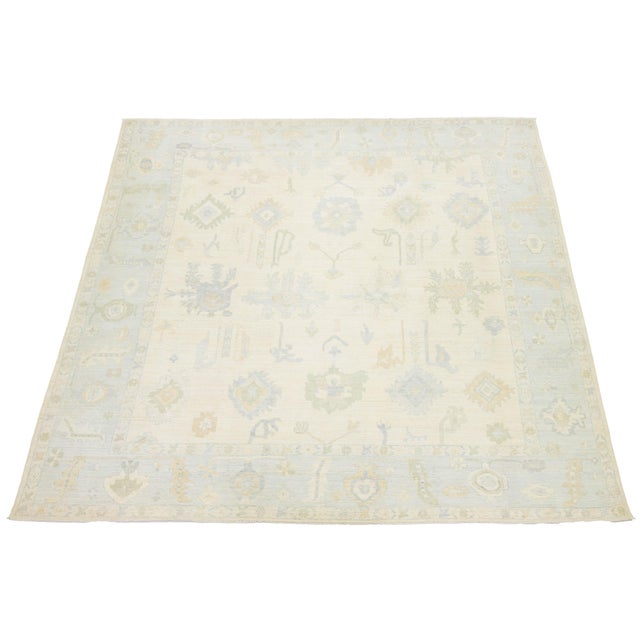 Coastal Artisanal Oushak Style Wool Area Rug: Neutral Ivory With Muted Floral Motifs For Sale - Image 3 of 11