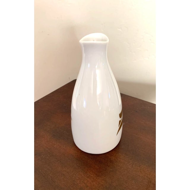 Stunning beautiful oval vase with gilt floral design on one side by Norwegian company Porsgrund. Great for your desk in...