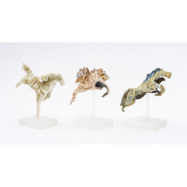 Group of Three Brutalist Polychrome Glazed Ceramic Horse Sculptures, signed "JJ" to the undersides, each mounted on...