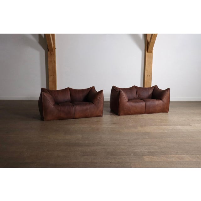 Beautiful pair of le bambole sofa in original brown buffalo neck leather designed by mario bellini for b&b italia in the...