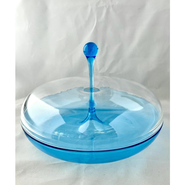 This fun biomorphic serving tray will brighten any table as it is sleek and colorful while fully functional for the...
