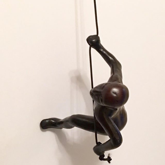 Our Deep Chocolate-Black Climbing Man is a beautiful addition to your wall decor! Curate your own collection with our...