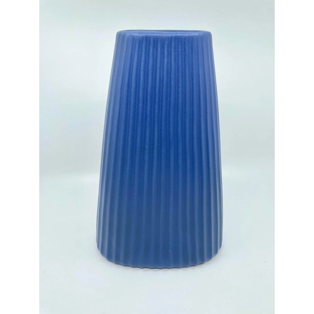 Vintage Royal blue art decor vase with vertical textured lines running up and down the vase. Perfect for florals or as is!...