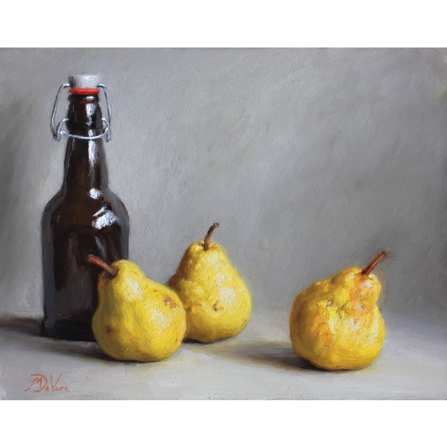 In "Pear Cider," a bottle stands alongside three ripe, yellow pears, creating a harmonious still life that evokes a sense...