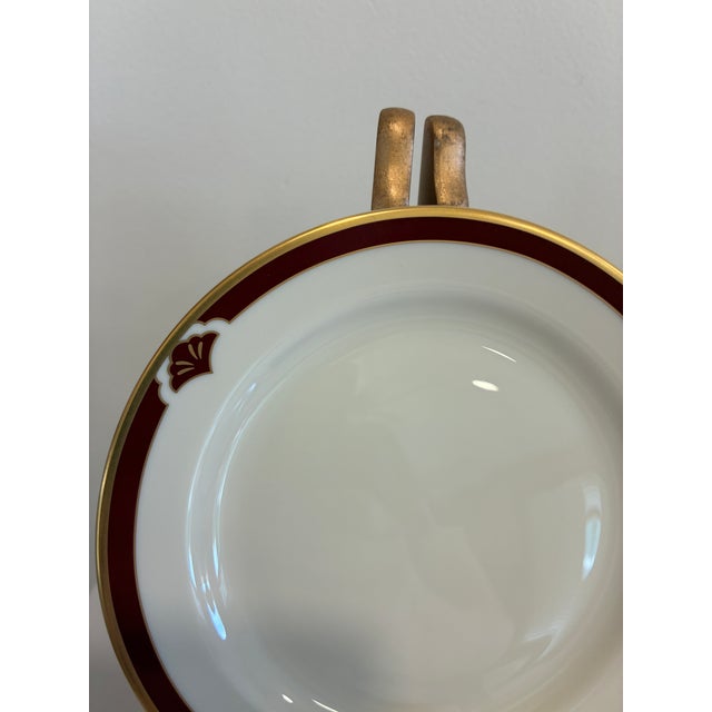 A charming set of 8 vintage finds Pickard Fine China bread plates, each finished with a burgundy band, gold trim, and...