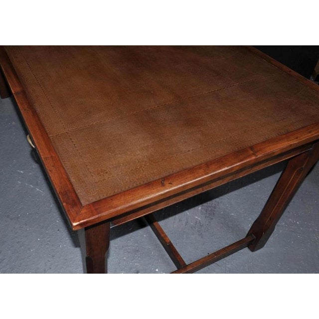 Gorgeous oak desk with a brown tooled leather writing surface. The oak gives this desk an unusual farmhouse look,...