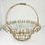 Vintage Home is pleased to present this vintage French Art Nouveau Iron Basket Jardiniere Planter. We curated this...