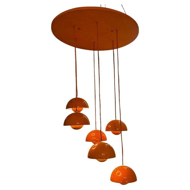 Six Light Enamelled Orange Flower Pot chandelier designed by Verner Panton (1926-1998) This multi light pendant followed...
