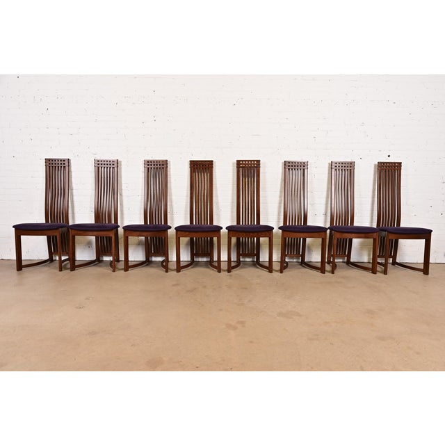 An exceptional set of eight Arts & Crafts style high back dining chairs In the manner of Frank Lloyd Wright or Charles...