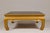 A Ming Dynasty style gold lacquered chow leg coffee table with carved apron. This vintage Ming Dynasty style coffee table,...