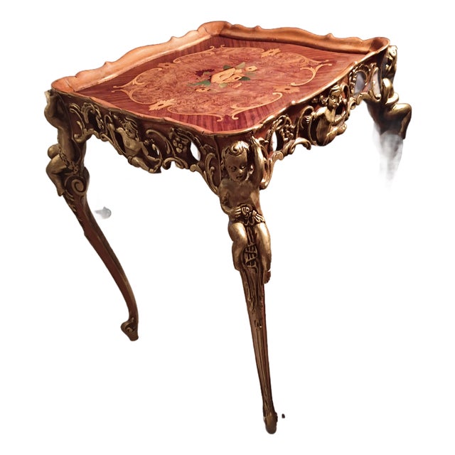 Intervention No, 16 Mid-Century Italian Hollywood Regency Gilt Cherub Table With Floral Marquetry Top For Sale