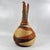These baskets represent an exquisite form of artistry among the Tutsi and other ethnic groups like the Hutu and Twa,...