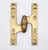 Vintage olive door hinge with a polished brass finish that swings right. The original mounting screws are not available....