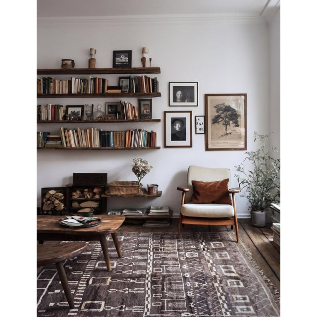 Contemporary Beni Mrirt Rug | Handwoven Berber Wool Rug with Taupe Field and Ivory Tribal Symbols This richly detailed...