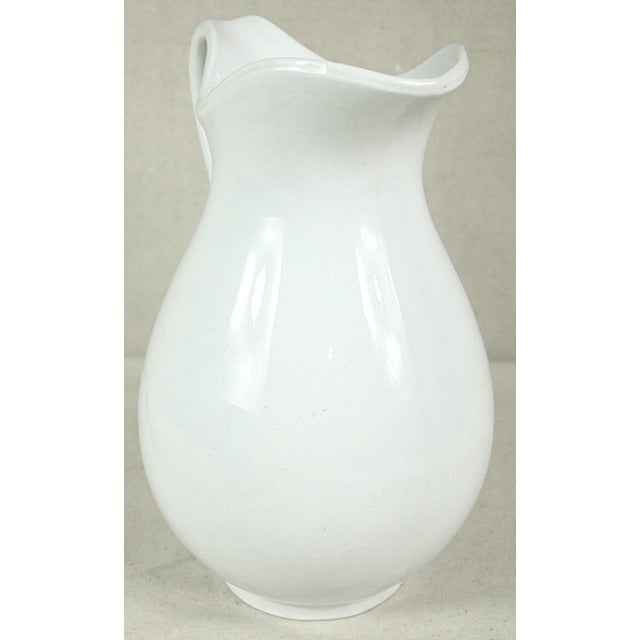 A Belgian ironstone milk or water picture dating from the late 19th century. It has a very unusual ovoid form for this...