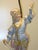 This is an antique table lamp. It's a really stunning and rather rare art figurine. The young man is wearing a superb and...