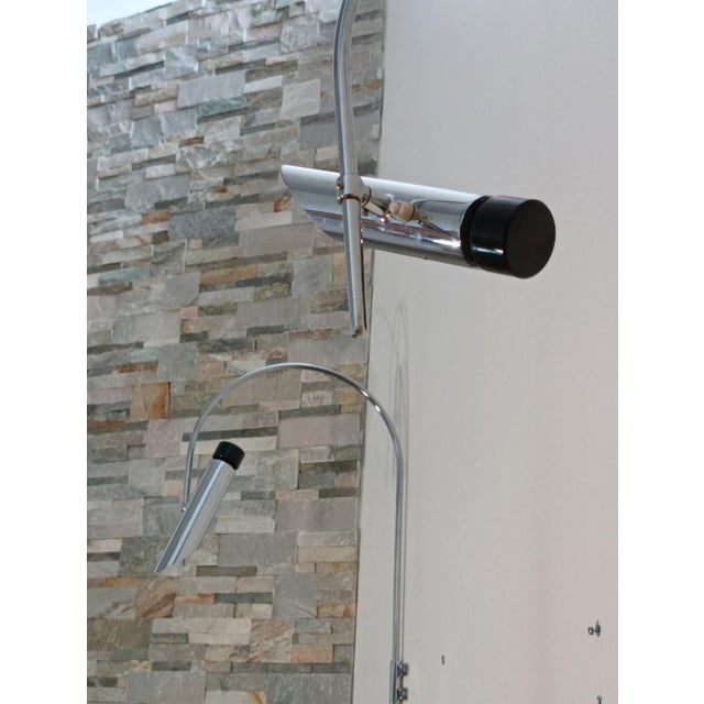 Magnificent pair of Tharsis wall sconces by Luis Perez De La Oliva for Fase. Spain, 1970s. Long, curved arm in chromed...