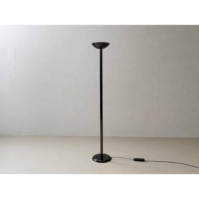 Striking italian floor lamp, model el/82, designed by mauro marzollo for tve milano in the 1980s. The lamp impresses with...