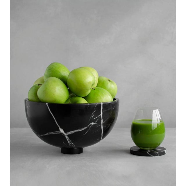 Introducing our exquisite Black Marble Bowl , a fusion of elegance and functionality. Crafted from luxurious black marble,...