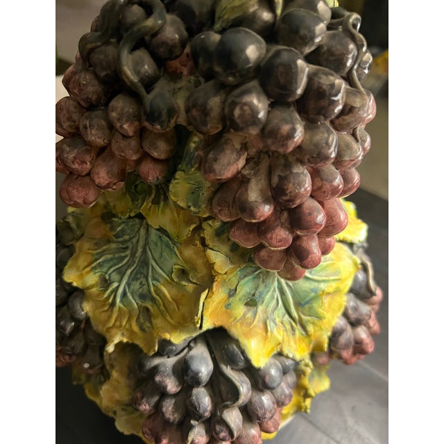 A masterful example of Italian ceramic artistry, this monumental grape harvest sculpture embodies the rich tradition of...