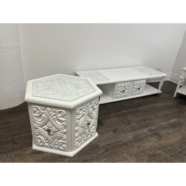 Unique shape coffee table, refinished into white high gloss. Avaliavle two more matching pieces from set. Made by...