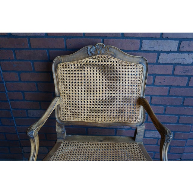 French Provincial Antique Carved French Walnut Cane Arm Chairs ~ a Pair For Sale - Image 3 of 12
