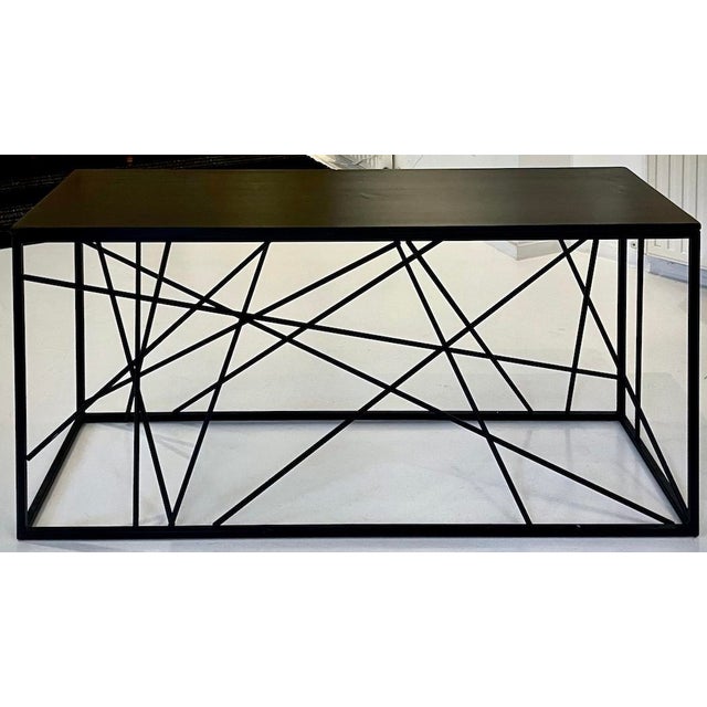 A study in structure and tension, the Tension Grid Console explores balance through intersecting steel lines contained...