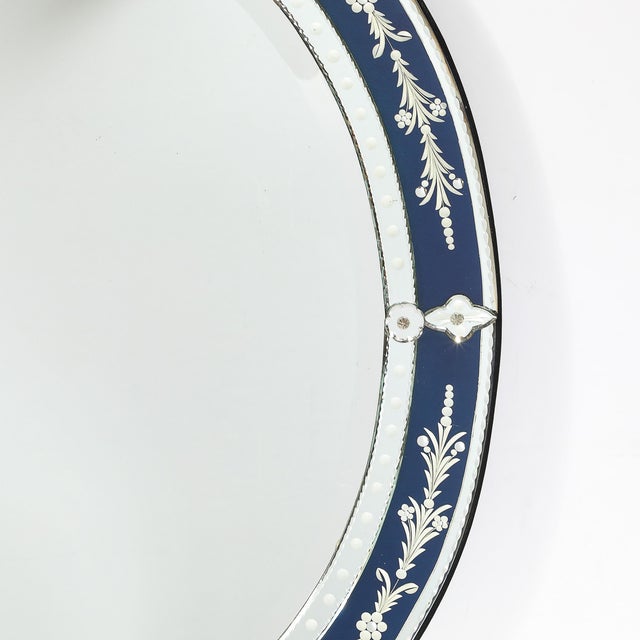 This elegant mid-century modernist Venetian glass oval mirror, crafted in Italy circa 1950, is a stunning example of...