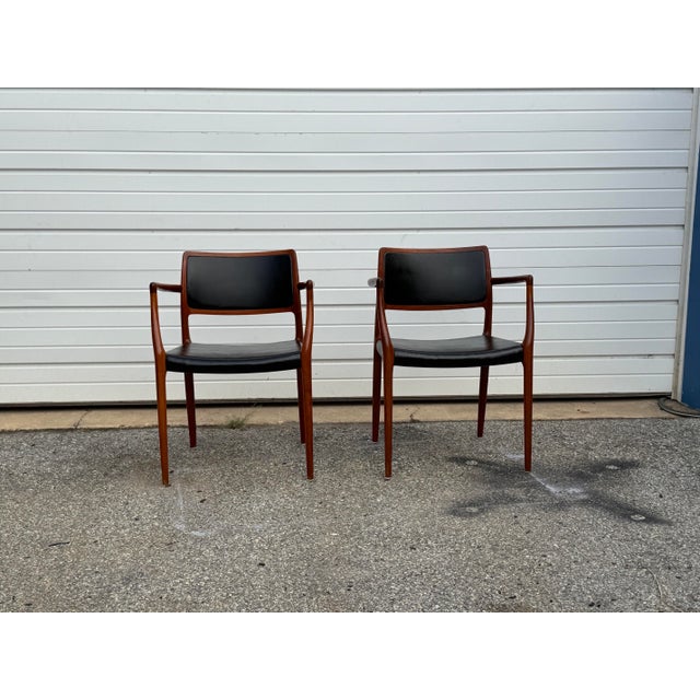 A beautiful pair of authentic Model No. 65 armchairs designed by Niels Otto Møller for J.L. Møllers Møbelfabrik in...