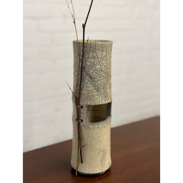 H11.5 (H18 with Branch) W13 Raku ceramic with a cut out along the middle and cane detail holing twigs into place. Ceramic...