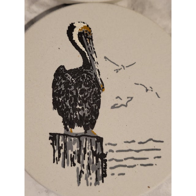 1970's set of pelican drink coasters. This set of 100% natural sandstone coasters will not warp or lose the ability to...