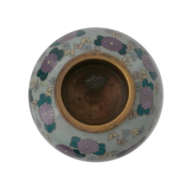 A miniature Japanese Meiji period vase, 1868 to 1912. The globular vase slightly tapering to the bottom decorated in...