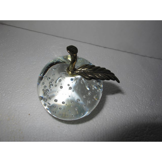 Very nice bubble glass apple paperweight. With detailed brass leaf and stem. Ideal use as a paperweight or for display....