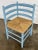 Vintage French Country style wooden ladderback corner chair in a french blue hue with rush seat. Original traditional rush...