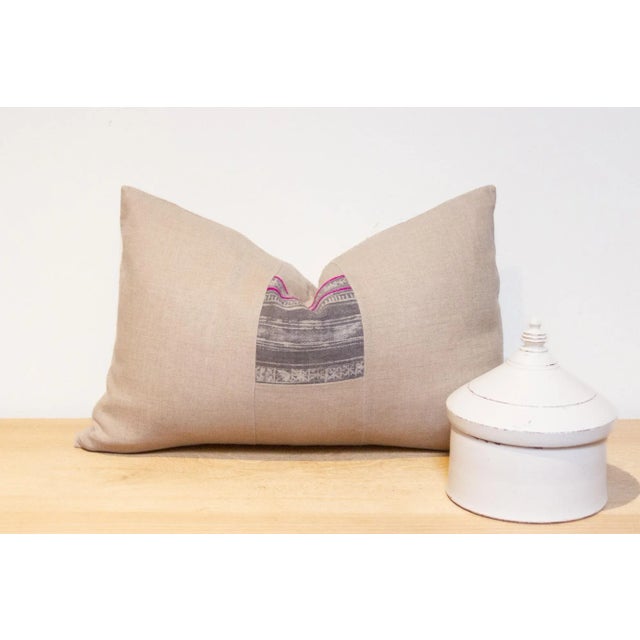 Magnificent lumbar pillow made from a wonderful batik Hmong fabric. Pillow have a center strip of rich Indigo textile...