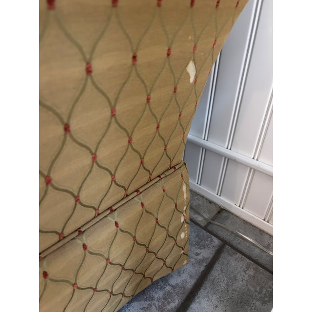 Loveseat with olive fabric with deep red dots. Would be great used as dining table banquette seating. Local pickup only.