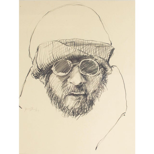 A 1967 charcoal portrait drawing by the American artist James L. Bruch (1942-2023). A man with a beard and mustache wears...