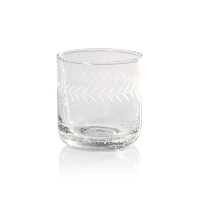 Tuscan Handmade Etched Rock Glass - Set Of Four A perfect blend of rustic elegance and artisanal craftsmanship, the Tuscan...