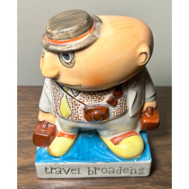 Up for sale is a Vintage 1950’s Ucagco Travel Broadens Man with Luggage Ceramic Novelty Figurine Made in Japan! It...