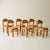 Set of six dining chairs by Rainer Daumiller, produced in the 1970s and crafted in solid pine. The design features a matte...