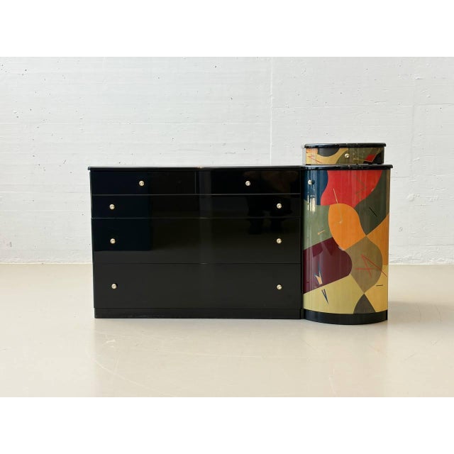 A striking chest of drawers with a matching round mirror, designed by carlo malnati, a leading figure of italian...